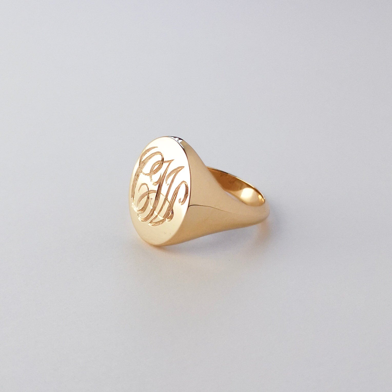 mens solid 14 karat yellow gold signet ring with hand engraved initials